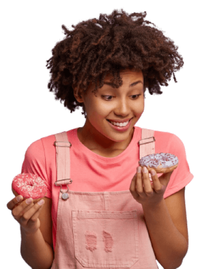A girl holding doughnut